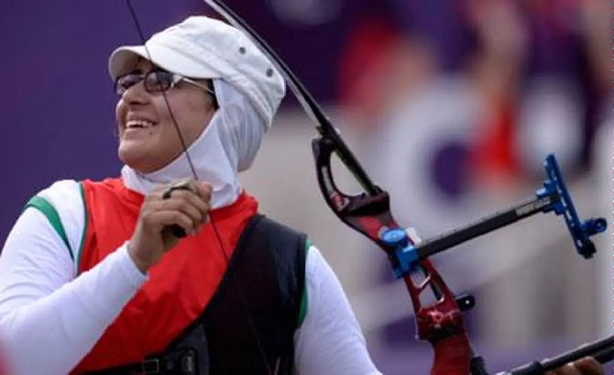 پرچم کاروان ایران در المپیک ریو توسط بهداد سلیمی به زهرا نعمتی اهدا شد+عکس