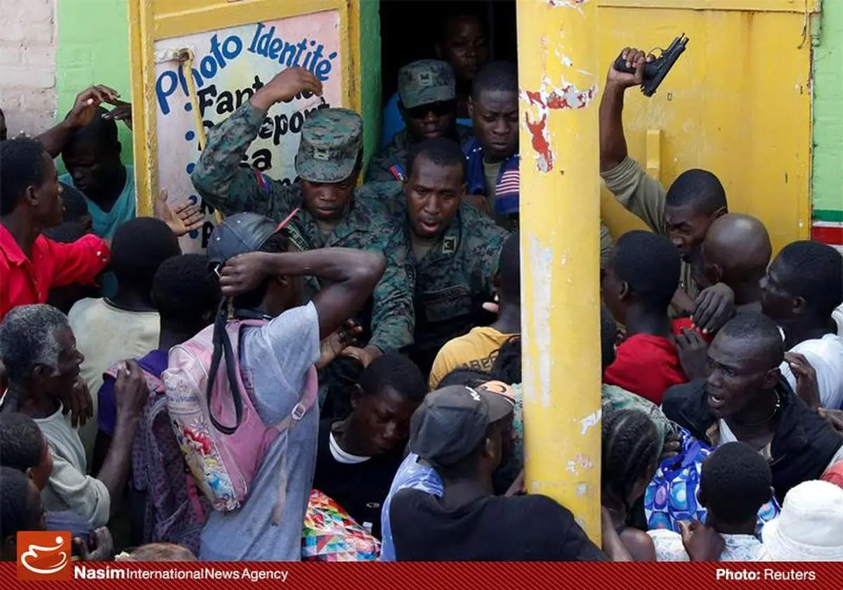 کمک به گرسنگان هائیتی با شلیک تیر هوایی