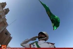 اهتزاز پرچم امام رضا(ع) در کمیته ملی المپیک