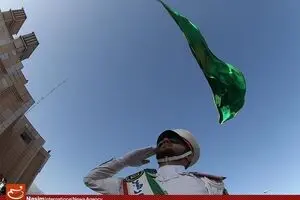 اهتزاز پرچم امام رضا(ع) در کمیته ملی المپیک