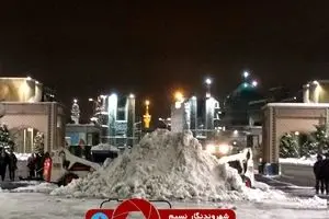 جمع آوری برف شب گذشته - مقابل باب الجواد