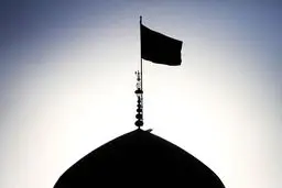 تعویض پرچم حرم امام رضا(ع) به مناسبت سالروز شهادت امام جواد(ع)