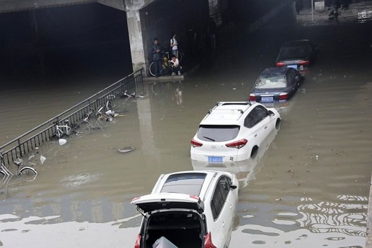 باران‌های موسمی در چین ۶۷۰ پرواز در پکن را لغو کرد