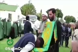 لحظات دیدنی از عشق و ارادت مردم زیمبابوه به پرچم متبرک امام رضا(ع)