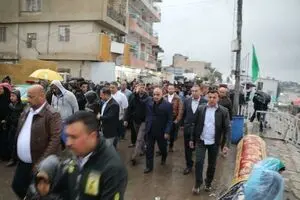 راهپیمایی میلیونی کاظمیه زیر باران شدید بغداد ادامه دارد