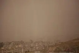 عکس: ریزگردها آسمان کرمانشاه را سیاه کرد