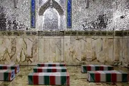 طواف شهدای تازه تفحص شده خان طومان در حرم مطهر رضوی