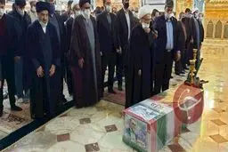 طواف پیکر دانشمند هسته‌ای در حرم کریمه اهل بیت