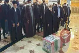 طواف پیکر دانشمند هسته‌ای در حرم کریمه اهل بیت