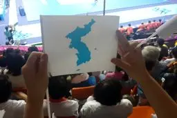 عکس خبری:: تماشاگران کره‌‌جنوبی از ورزشکاران کره‌شمالی حمایت می‌‌کنند