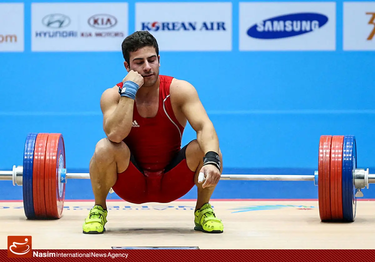 گزارش تصویری:: کسب مدال نقره رقابت‌های وزنه‌برداری بازی‌های آسیایی اینچئون توسط کیانوش رستمی
