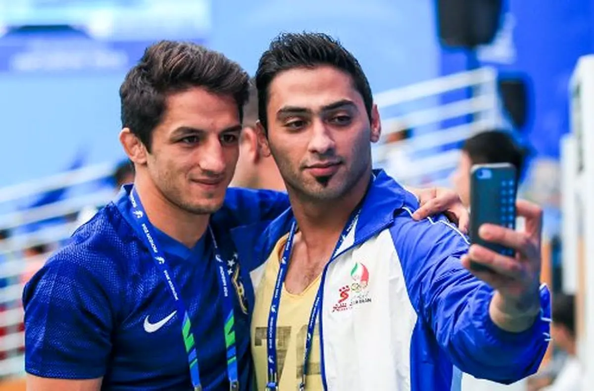 ملی‌پوشان وزنه‌برداری با سوریان عکس یادگاری گرفتند