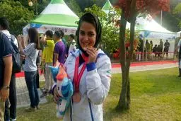 گزارش تصویری:: توزیع مدال طلای نجمه خدمتی در مسابقات دانشجویان جهان