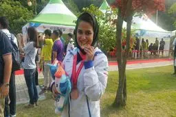 گزارش تصویری:: توزیع مدال طلای نجمه خدمتی در مسابقات دانشجویان جهان